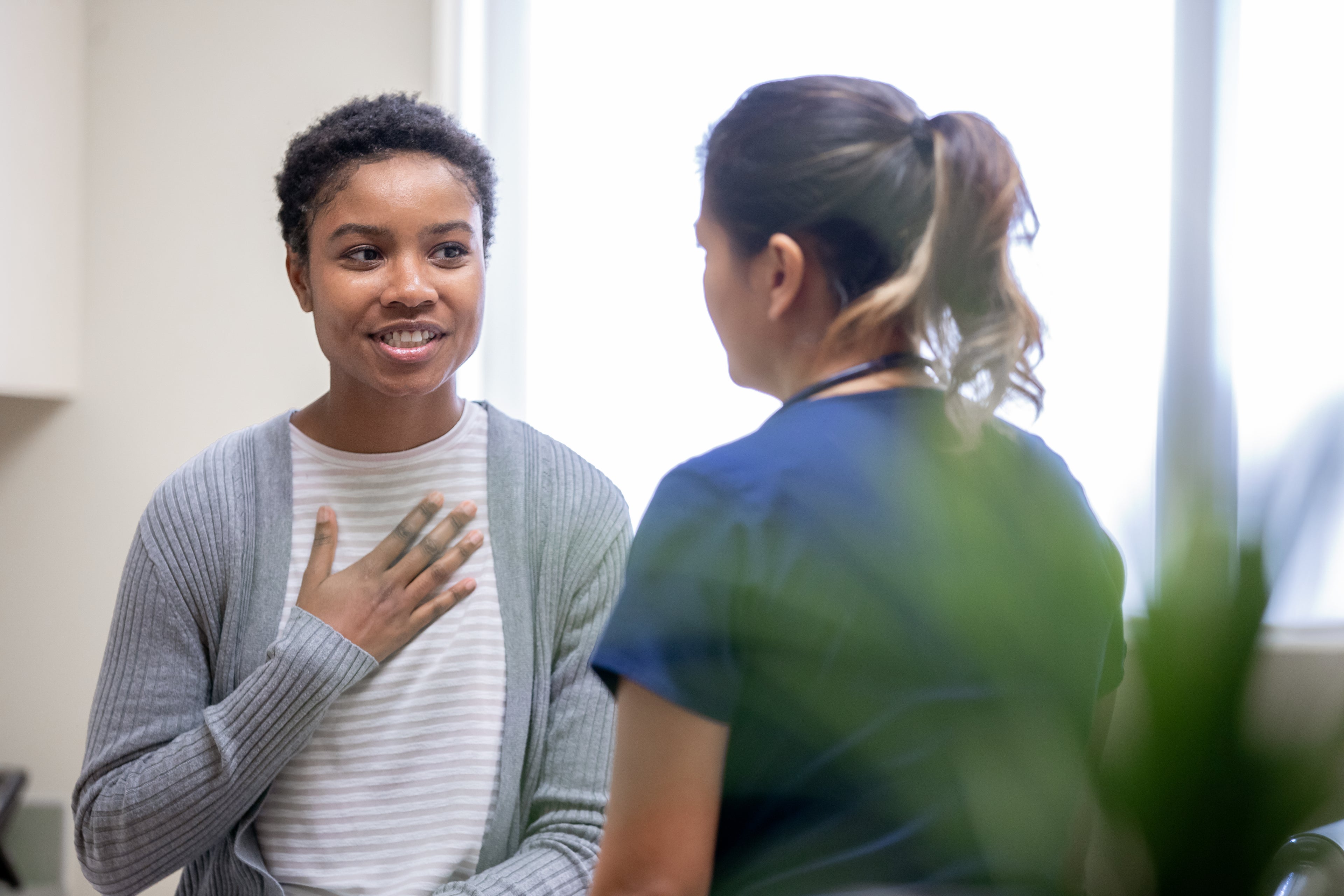 Patient talking to doctor