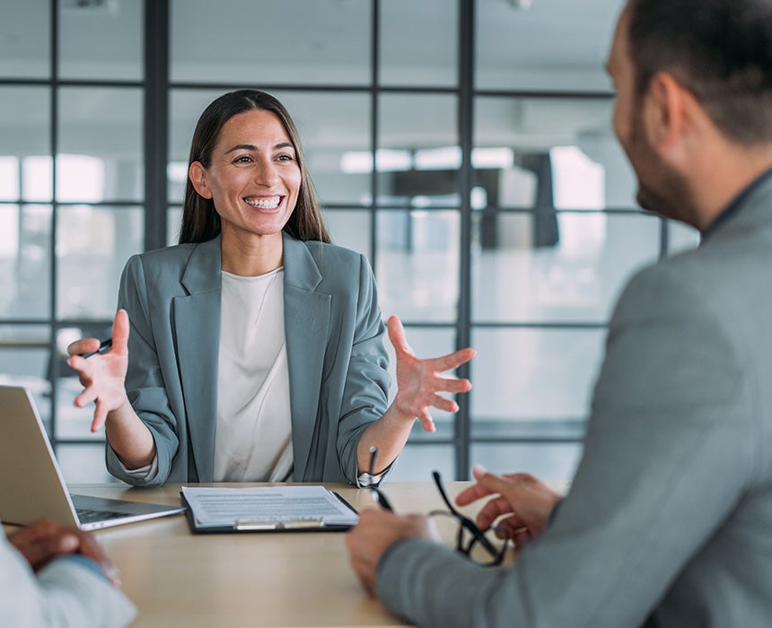 lawyer smiling at clients