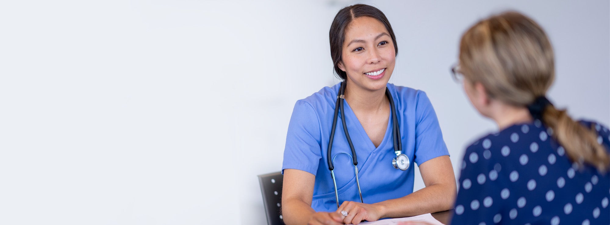 Doctor consulting patient