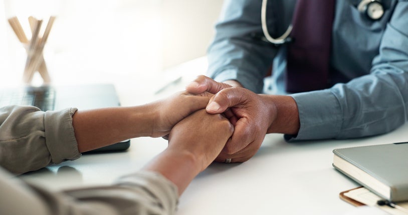 doctor holding hand