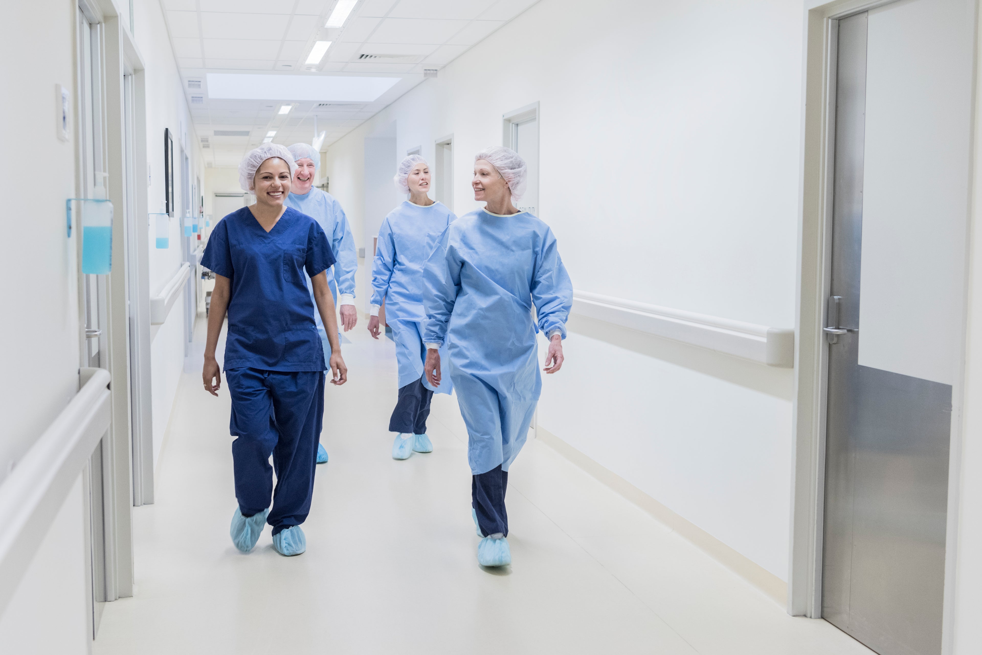 Doctors walking in corridor 
