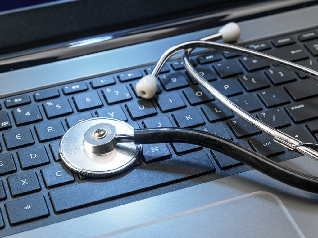 Stethoscope on laptop
