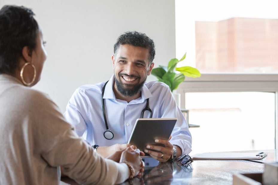 doctor talking to patient