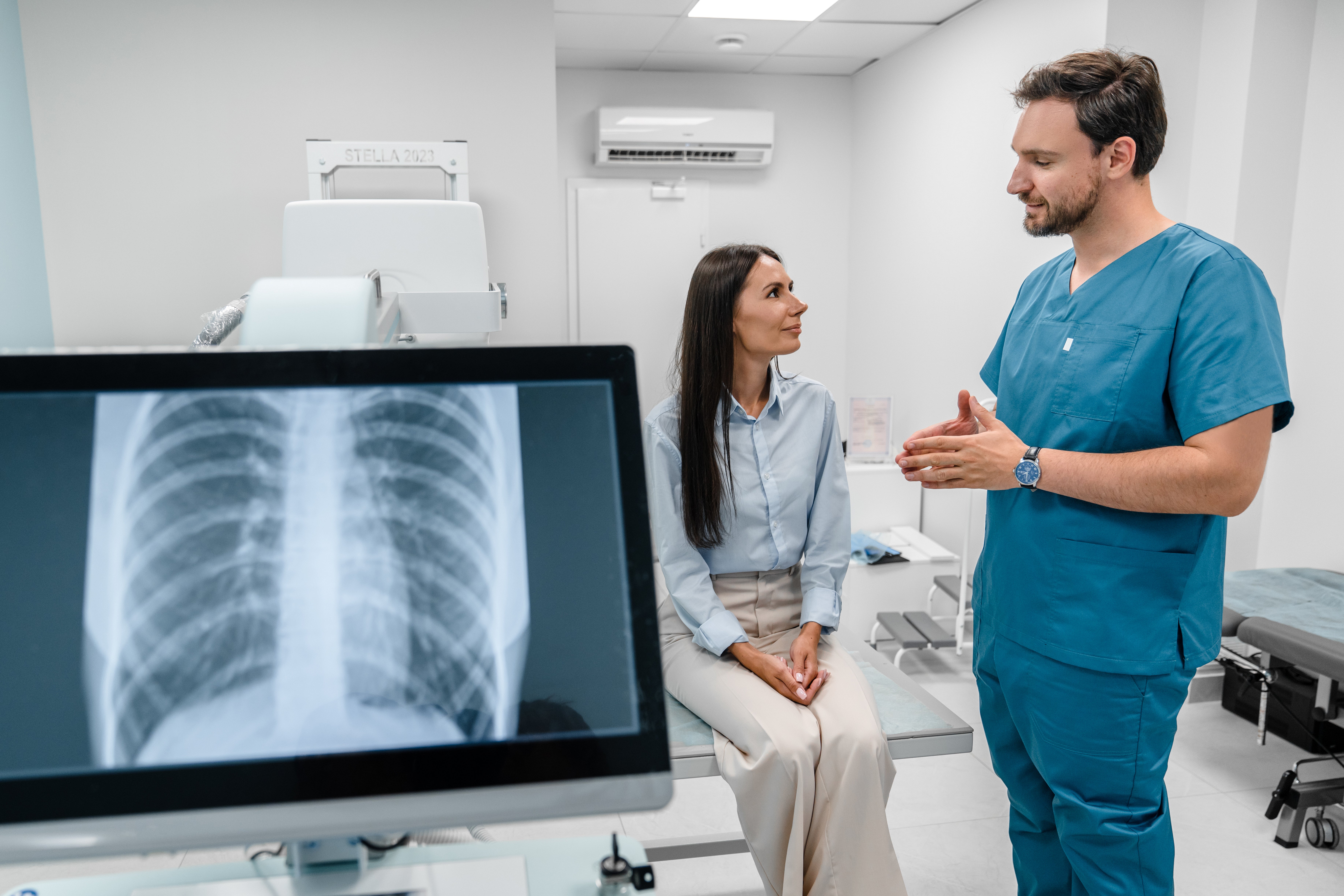 Doctor with patient explaining scan