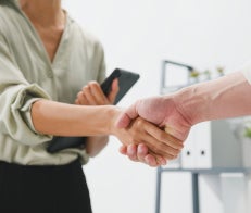 doctor and patient shaking hands 