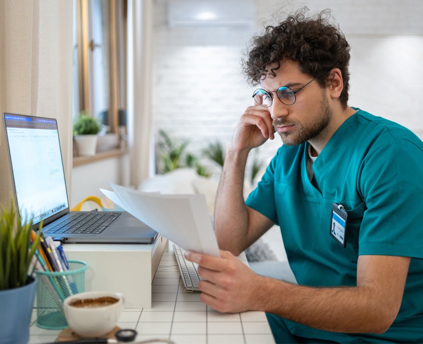 man looking at computer