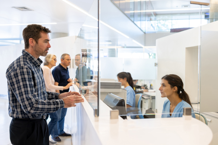 Patients at practice counter