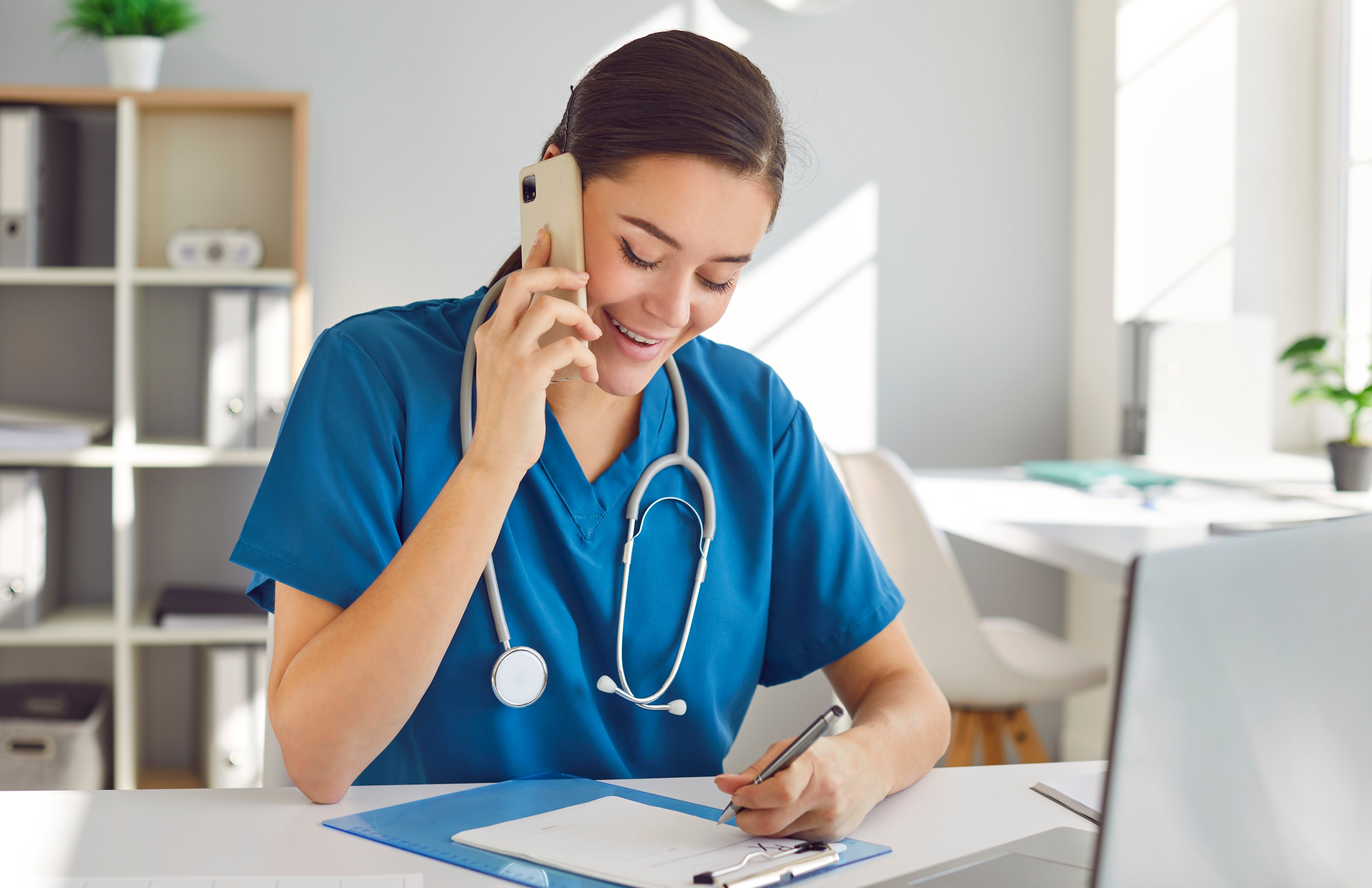 female doctor on the phone