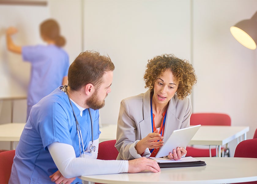 Doctor talking to nurse