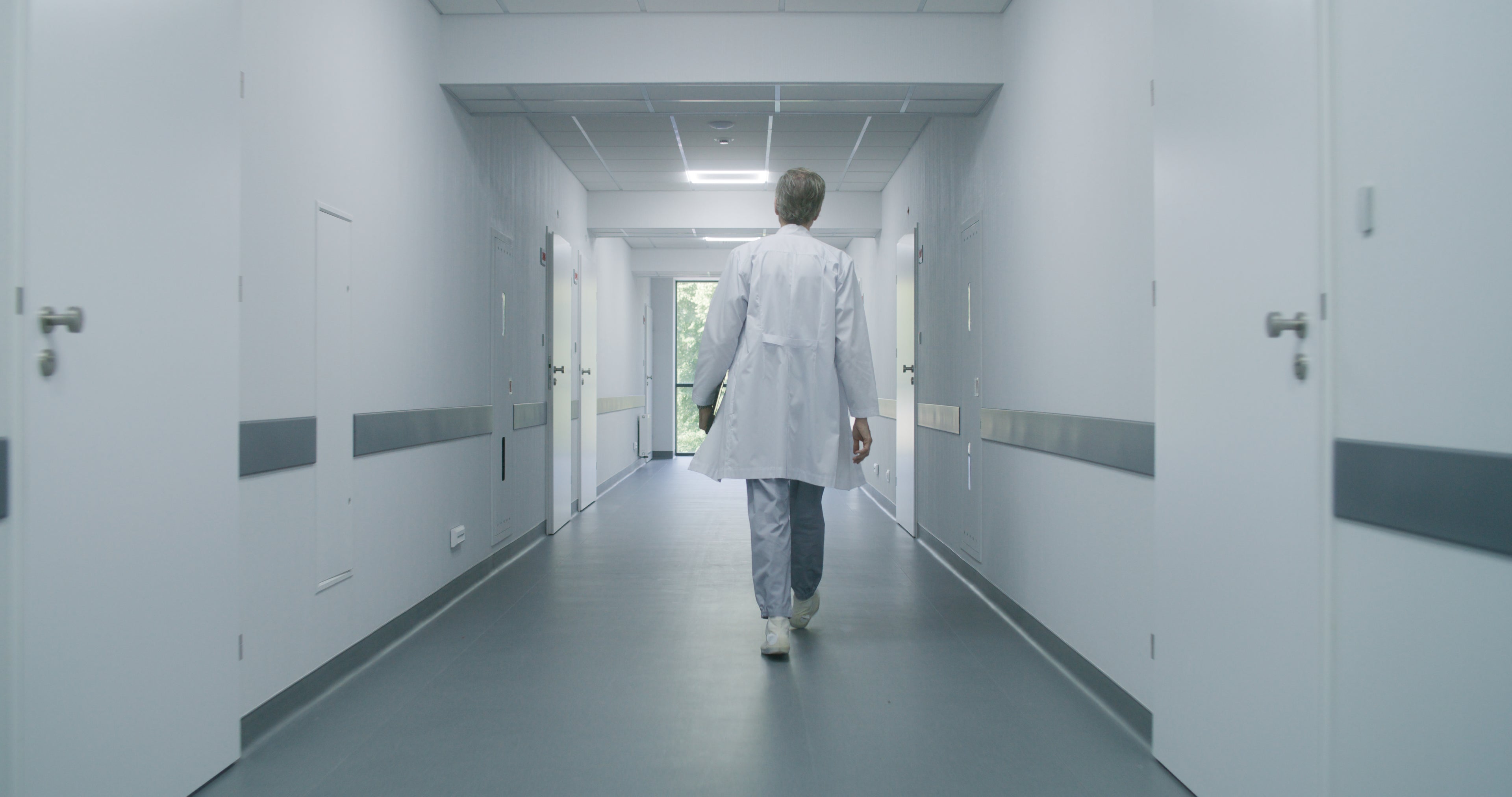 doctor walking through hall