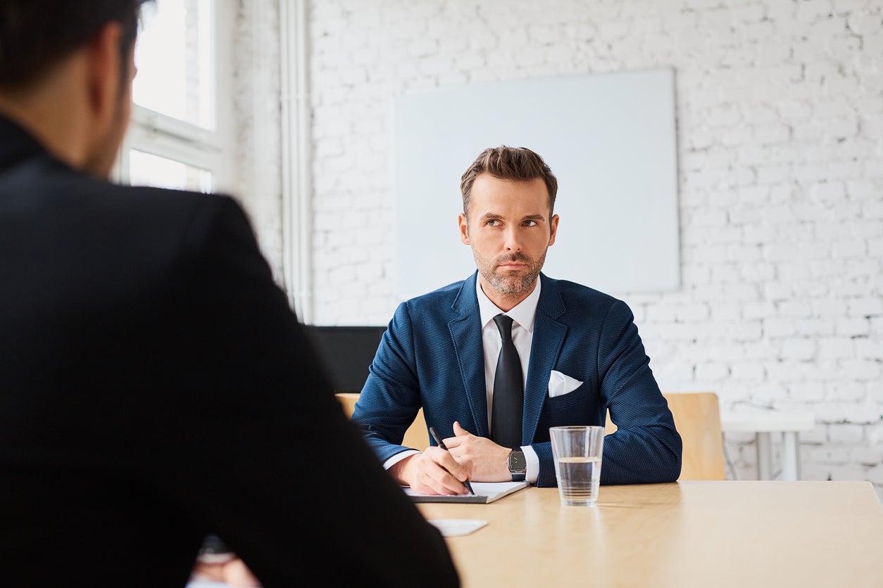 two men in a meeting