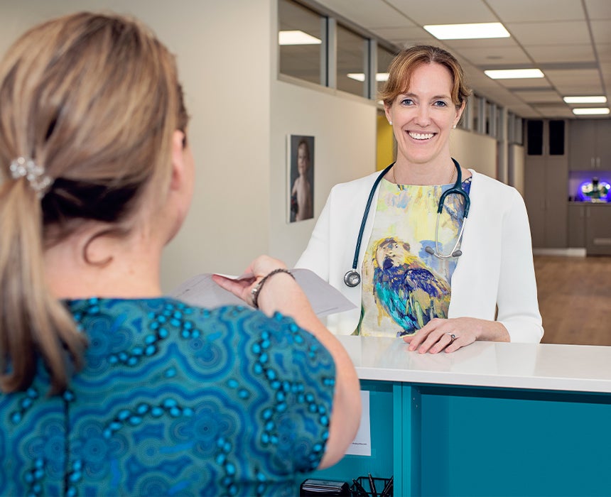 Medical receptionist and doctor