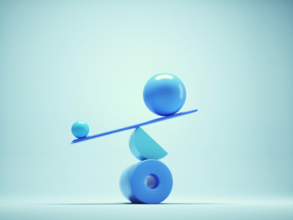 Graphic of a blue balancing beam with two balls on either end, the smaller one significantly weighing down the larger one.