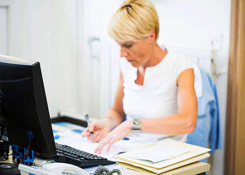 Receptionist on computer