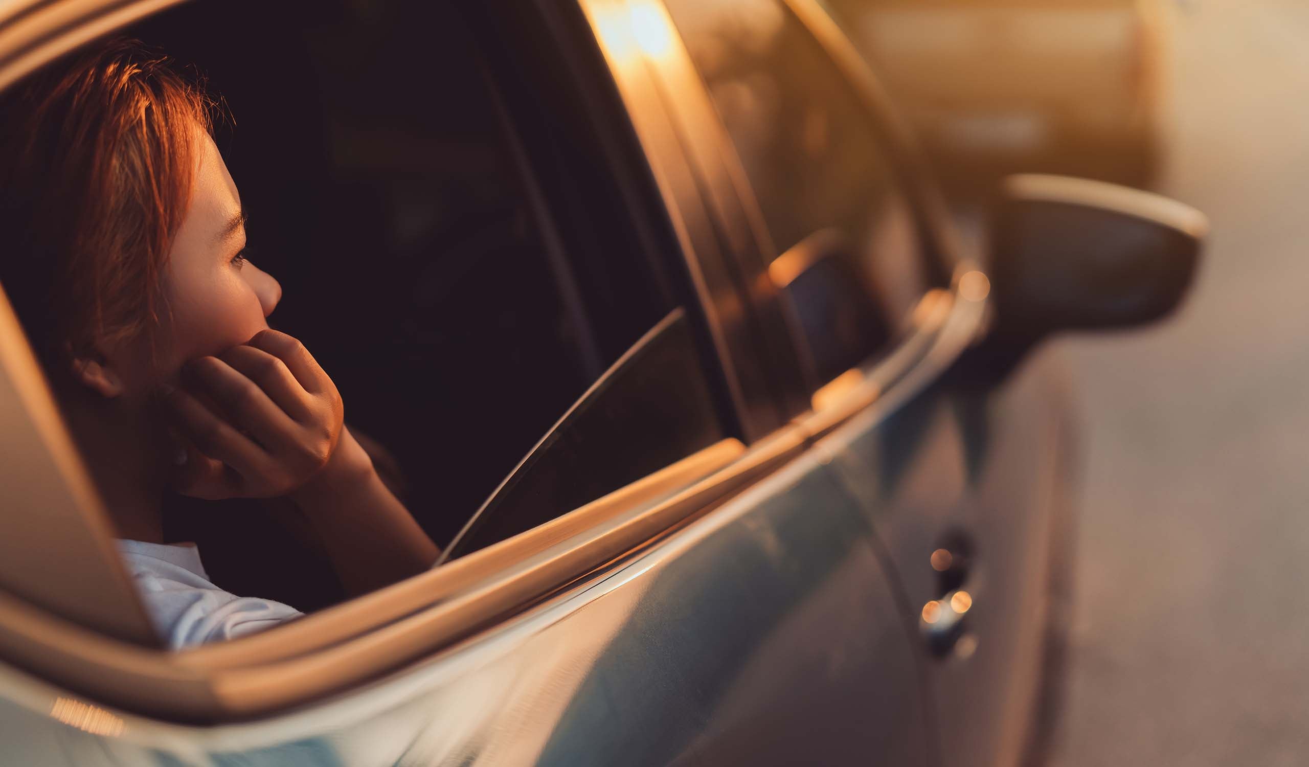 Woman in car. 