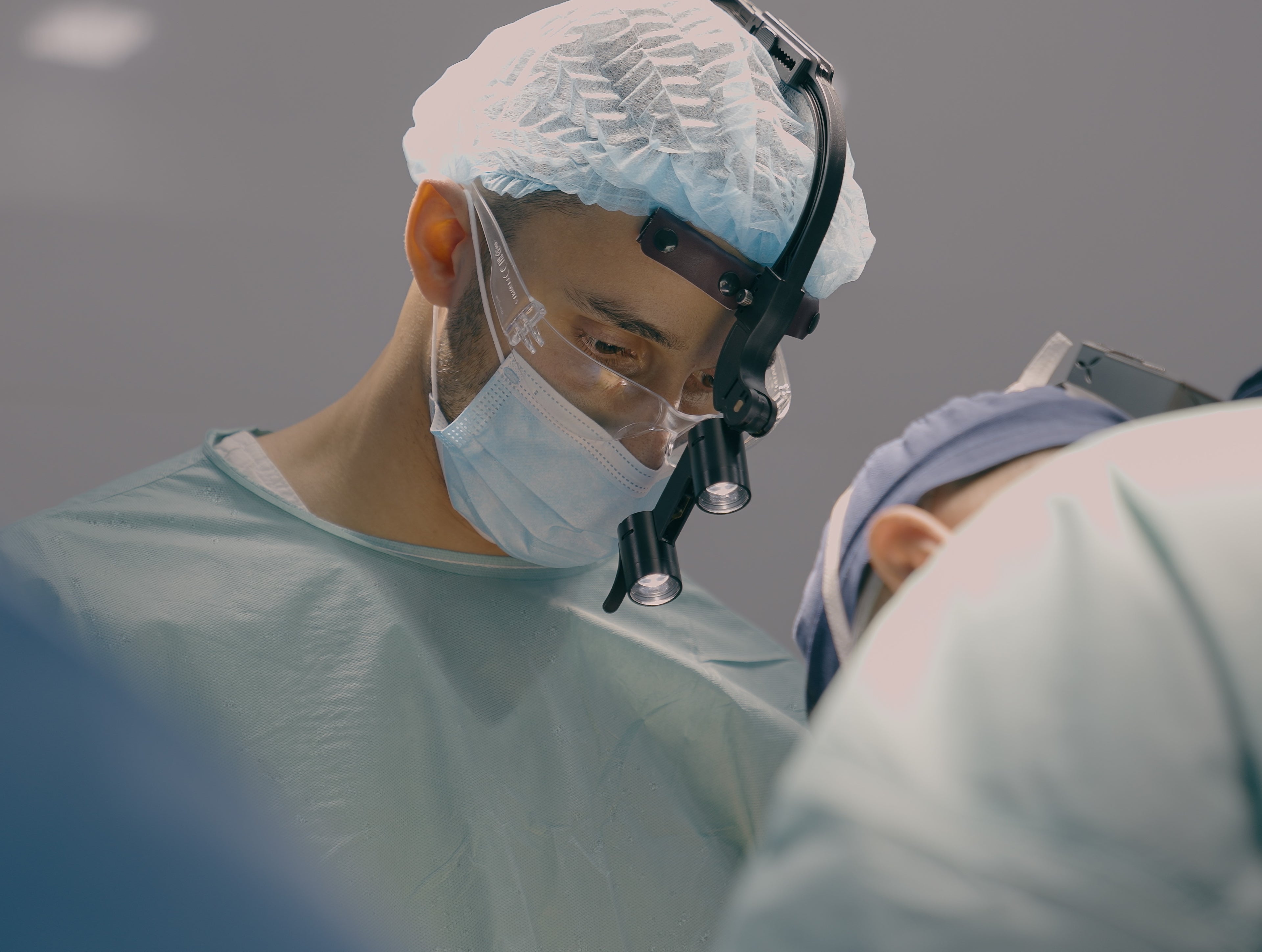 male surgeon with PPE