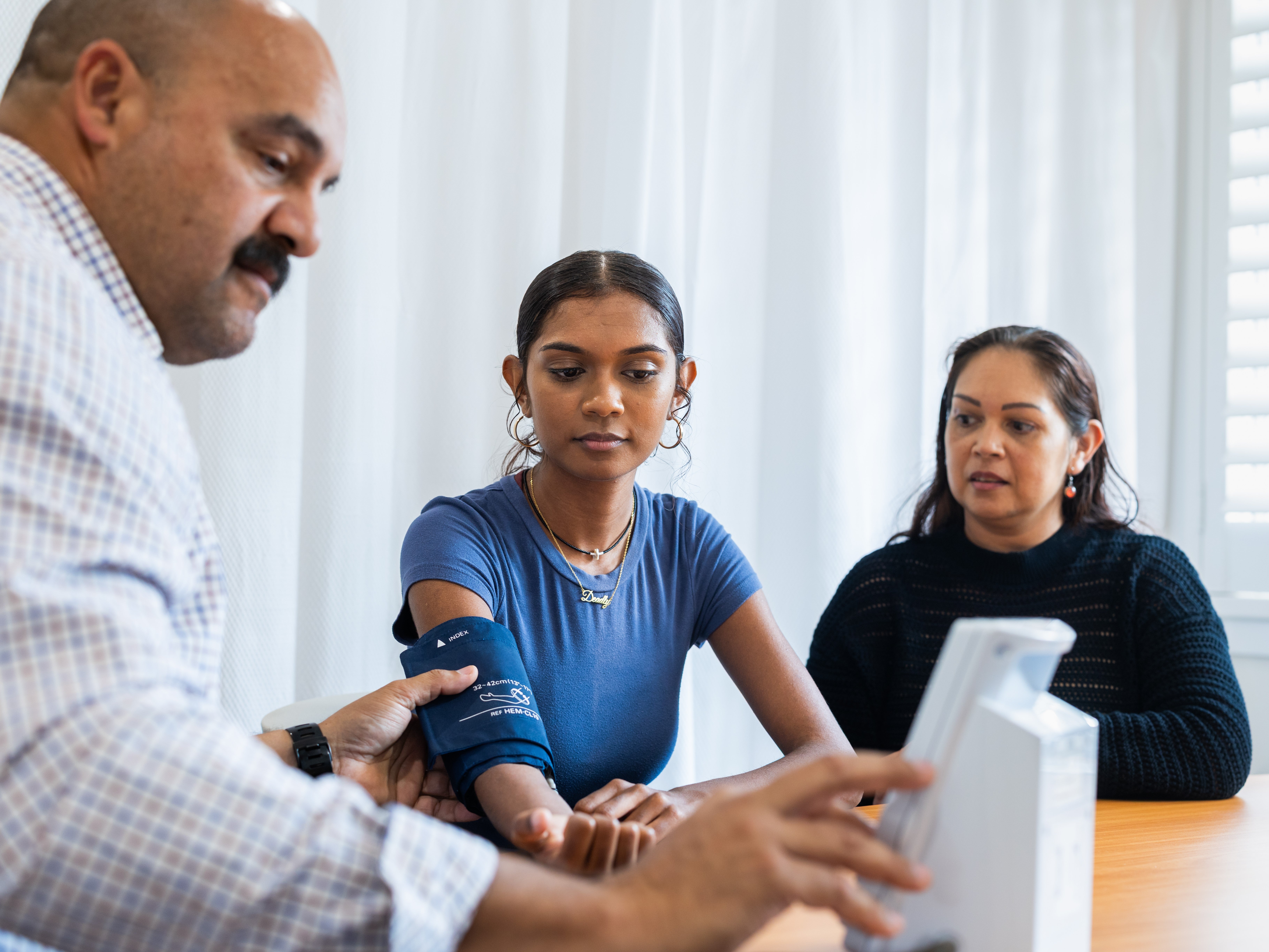 GP with teenage patient