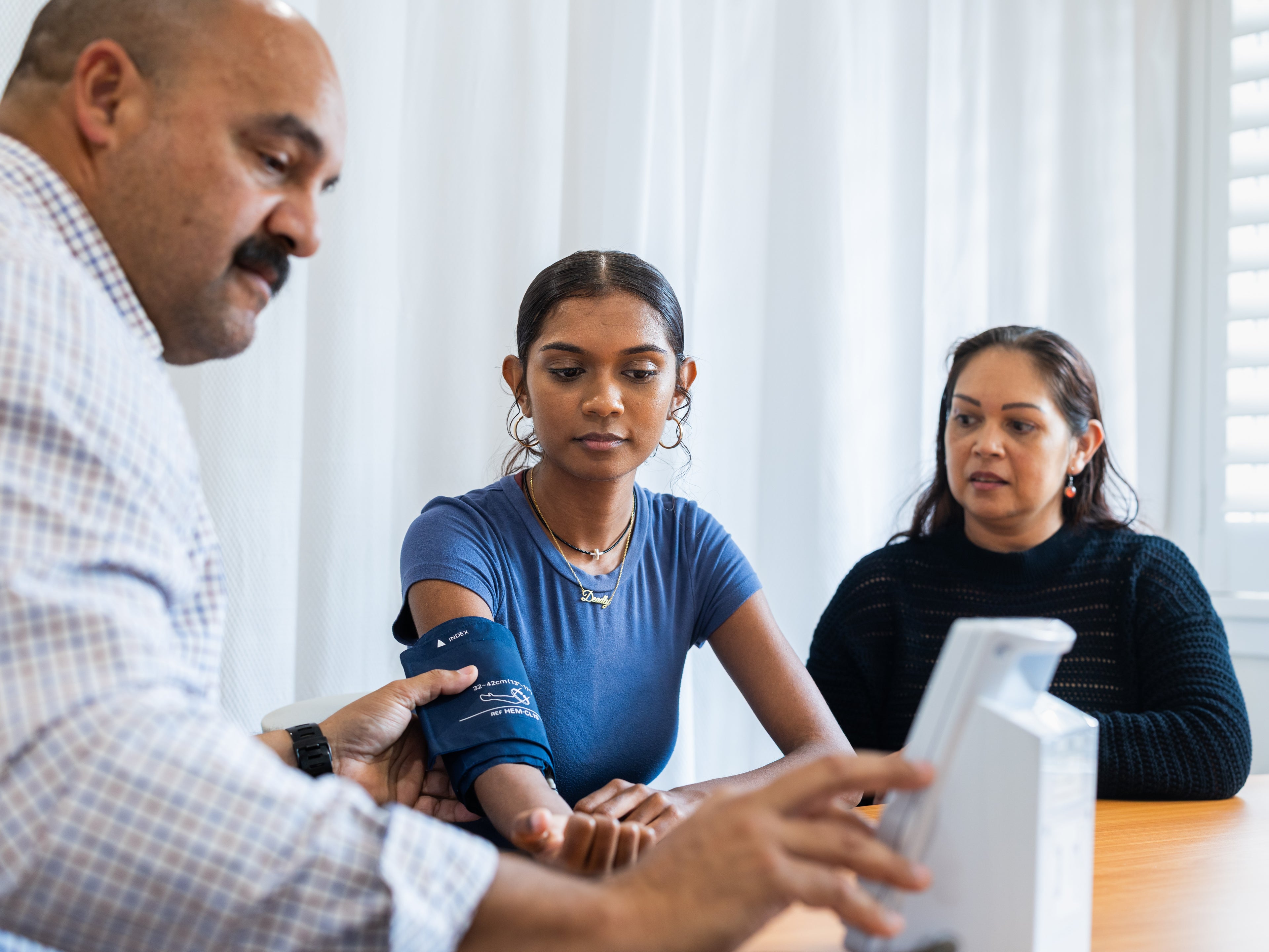 GP with teenage patient