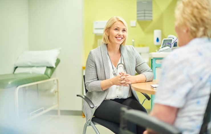 doctor talking to patient