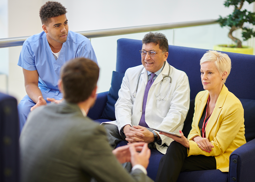 doctor talking with team