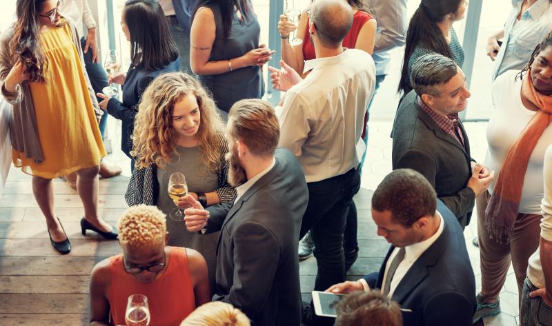 People socialising at an event