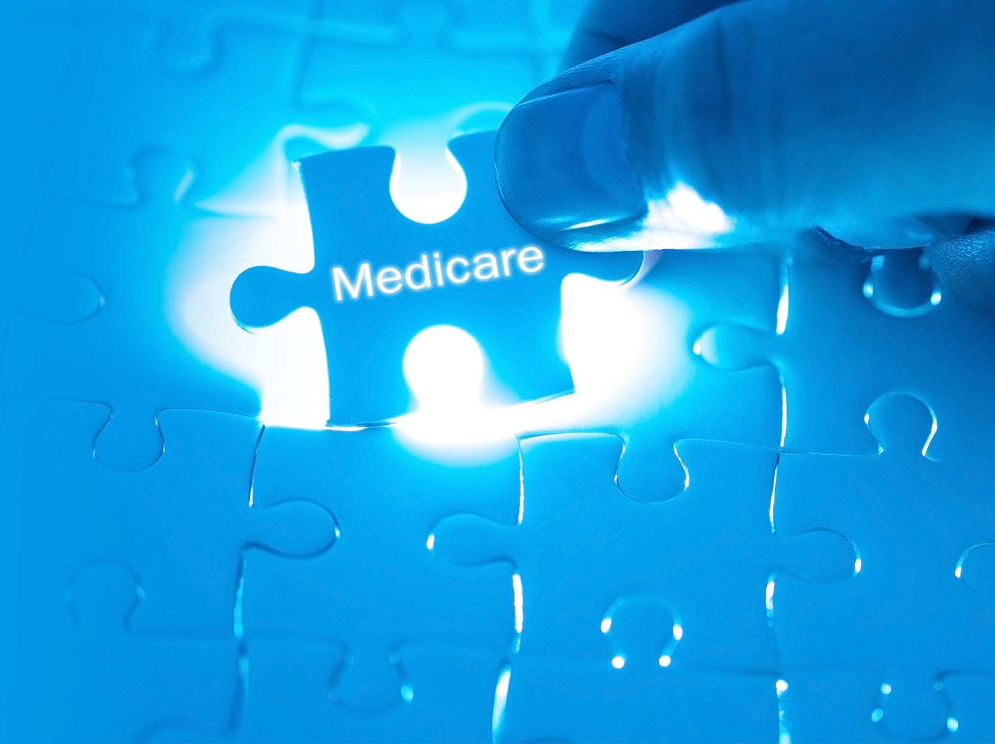 Medicare created a puzzle piece being put into place