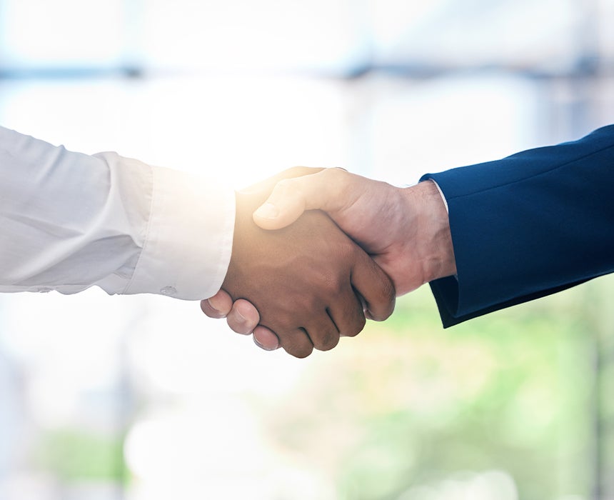 Hand shake between two people