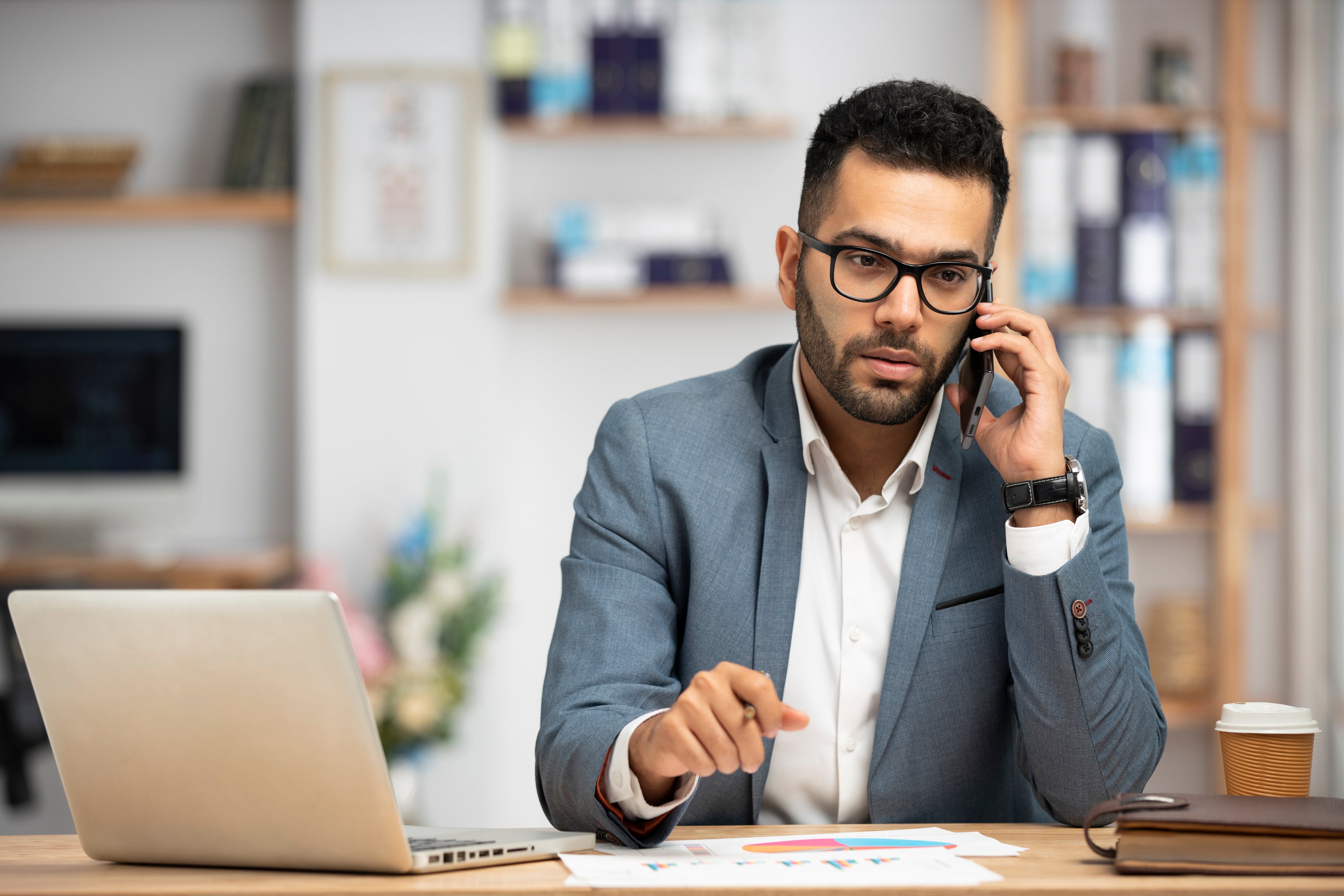male professional on the phone 