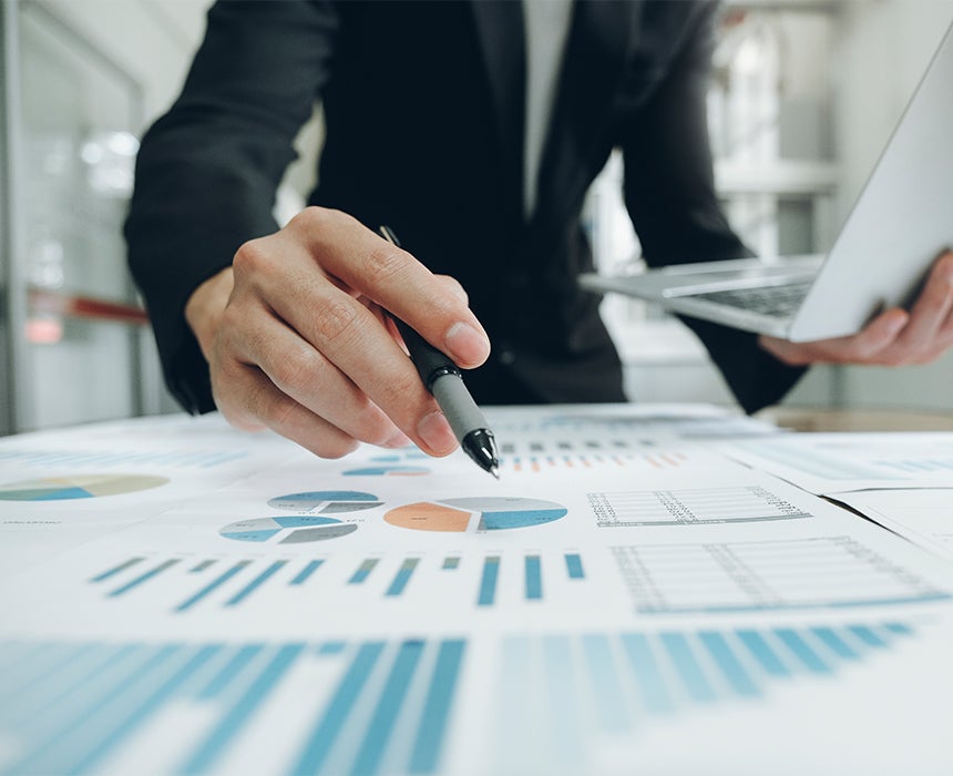 Worker looking over reports