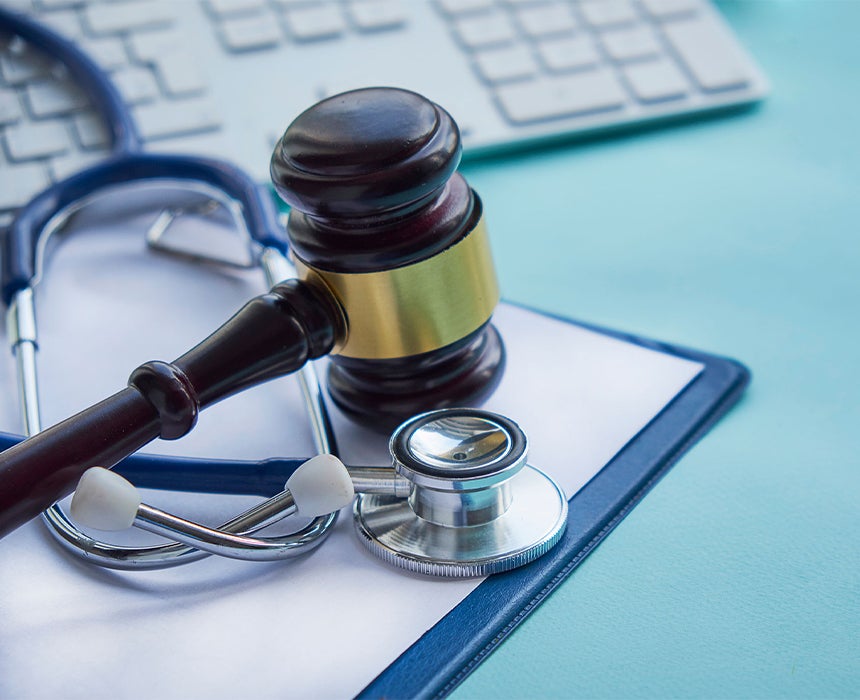 Gaval with stethoscope and paper