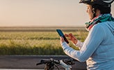 Someone riding bike in rural setting