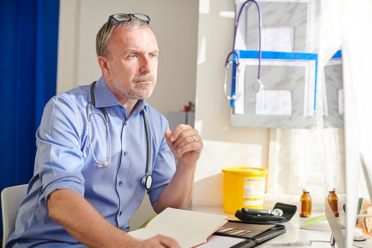doctor with paperwork