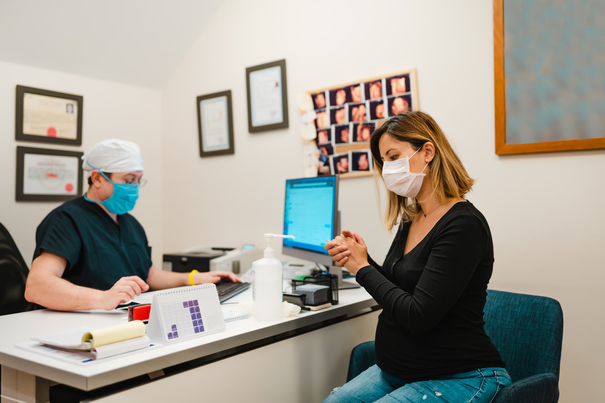 doctor and a patient both wearing masks 