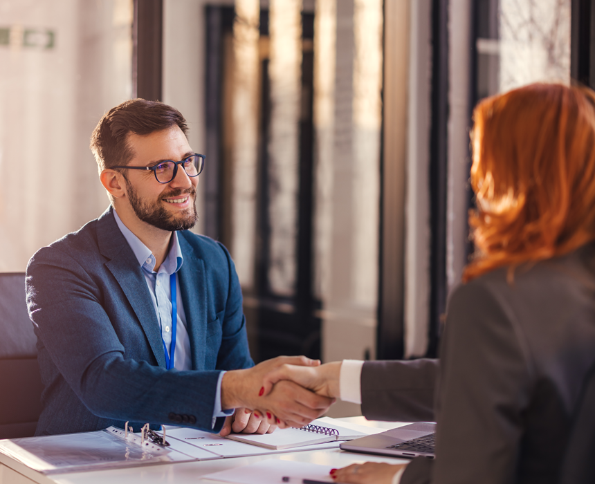 2 lawyers shaking hands